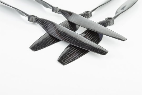 Carbon fiber drone propeller. Stock image macro.