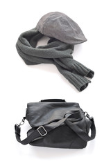 Gray cap warm scarf and Black wrinkled leather bag with shoulder strap.on a white background.