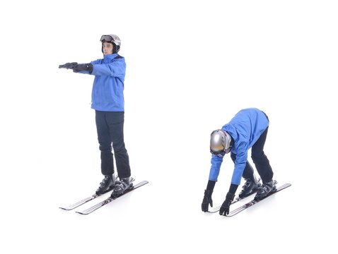 Skiier demonstrate warm up exercise for skiing. Bend forward.