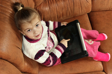 little girl with the tablet