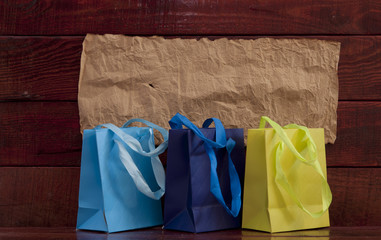 Shopping bag on wooden background