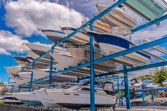 Boats stored up in dry storage waiting for maintenance