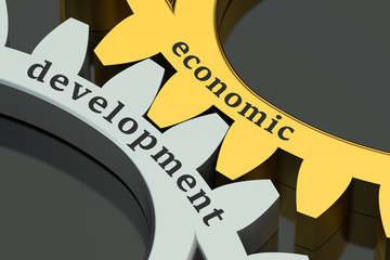 Economic Development concept on the gearwheels - obrazy, fototapety, plakaty
