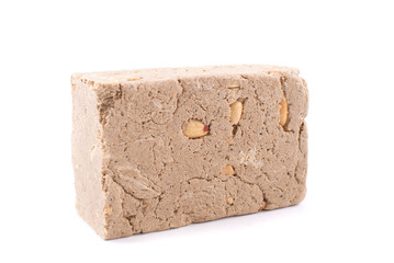 Halva with nuts on a white background.