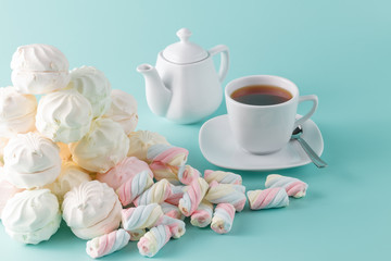 Obraz na płótnie Canvas Lot of vibrant marshmallow on aquamarine background