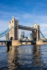 Naklejka na ściany i meble View of the famous London Tower bridge with the skyscrapers of t