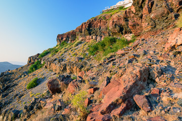 Fototapeta na wymiar Red rocks of Santorini island, Greece