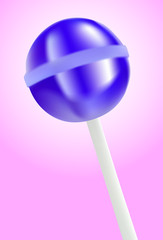 Blue lollipop on pink background