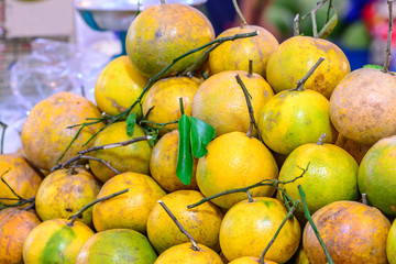 Fresh organic oranges are selling at supermarket.