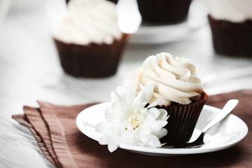 Tasty cupcake on served table, close up