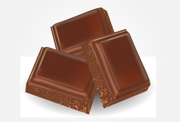 Broken milk chocolate bar isolated on white background