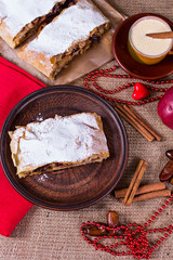 Apple strudel, apple pie and a cup of coffee. The atmosphere for a cozy romantic evening. Valentine's day.
