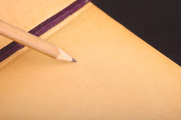 simple wooden pencil and notepad