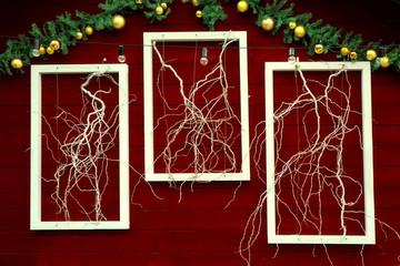 Christmas decorations on wooden wall