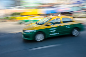 Fototapeta na wymiar Moving Thai taxi.