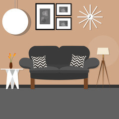 living room with sofa small desk hanging and standing lamp brown wall dark 