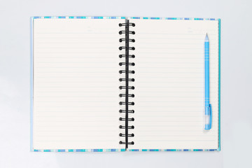 Notebook with a pencil