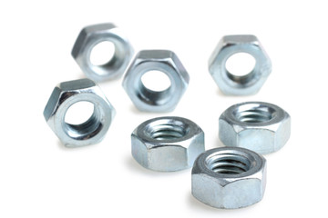 a bunch of new clean nuts isolated on white background