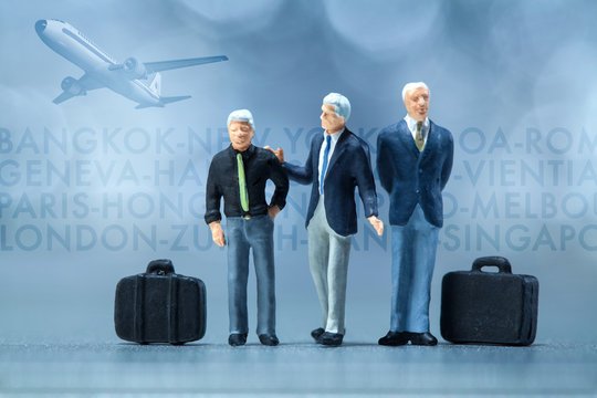 Miniature people -  businessmen  waiting in the airport lobby