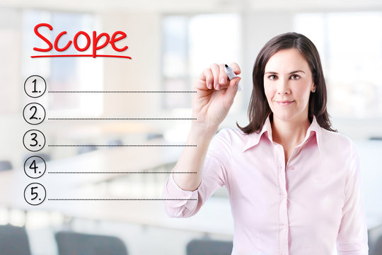 Business woman writing blank Scope list. Office background. 