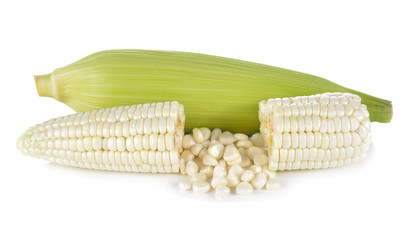 uncooked white corn wil leaf on white background