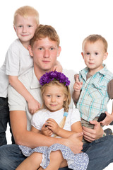 Younger brothers and sister with elder brother