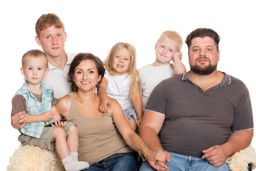 Happy big family sitting on sofa