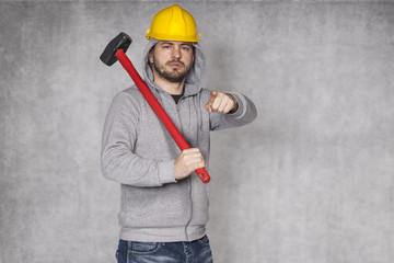 Portrait of a builder who shows you