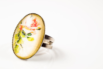 Macro of handmade vintage ring with antique silver isolated on white background
