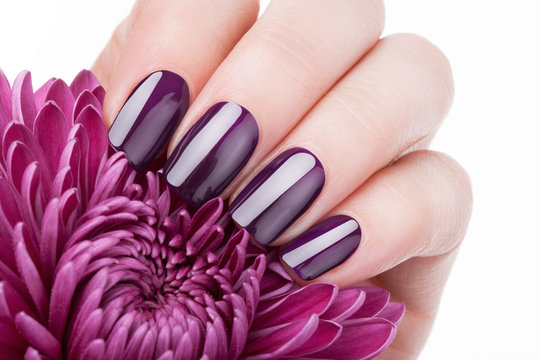 Red nail polish.