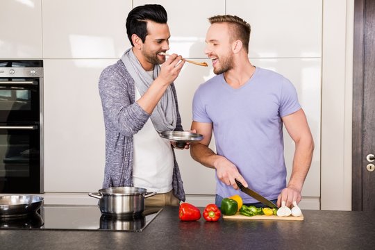 Smiling Man Tasting Food 