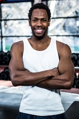 Fototapeta premium Muscular man posing with crossed arms 