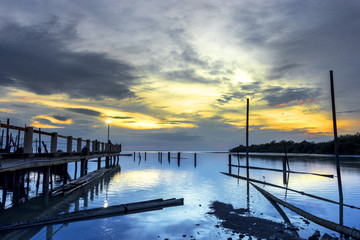 Jetty with sunset background