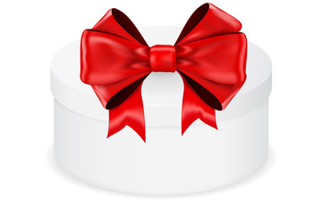 Round gift box and red bow.