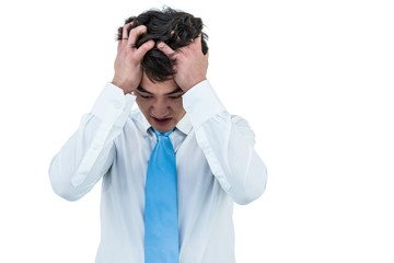 Irritated asian businessman holding his head