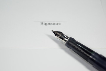 Unterschrift auf einem Vertrag
