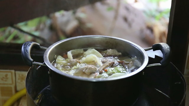soup in pot the boiling at kitchen