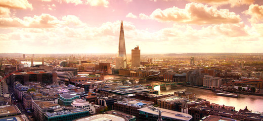 LONDON, UK - APRIL 22, 2015: City of London view and River Thames at sunset