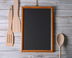 Blackboard and serving spoons