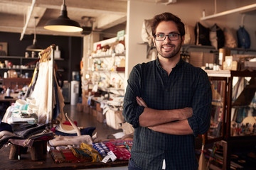 Portrait Of Male Owner Standing In Gift Store