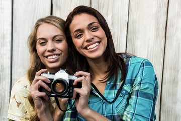 Two smiling female friends 