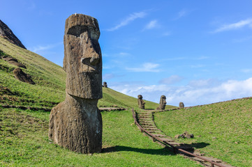 Moai statues in Rano Raraku Volcano, Easter Island, Chile - obrazy, fototapety, plakaty