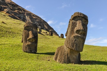 Moai statues in Rano Raraku Volcano, Easter Island, Chile - obrazy, fototapety, plakaty