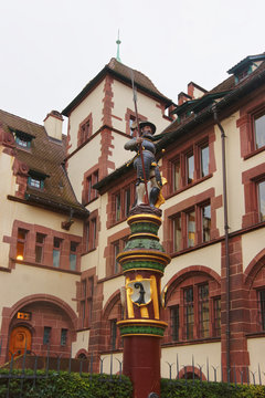 Street view with Fountain in the Old City of Basel