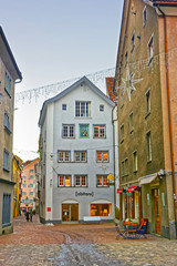Fototapeta na wymiar View to Martinsplatz with Christmas decoration in Chur Old City
