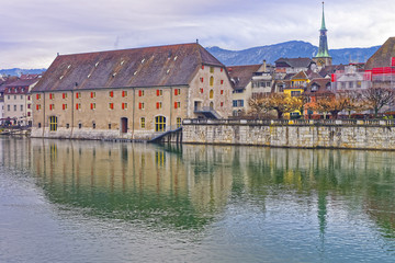 Naklejka na ściany i meble Waterfront with Landhaus and Clock Tower in Solothurn in Switzerland
