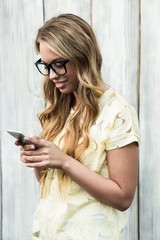 Smiling women using mobile phone 