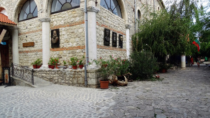Backyard with paving stones of bulgarian house in Nesebar.