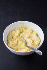 Dough of grated potatoes and egg for potato pancakes