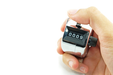 number 0009 (selected focus) shown in number counter on hand wit